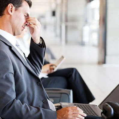A man in suit stressed at work